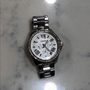 Silver fossil watch